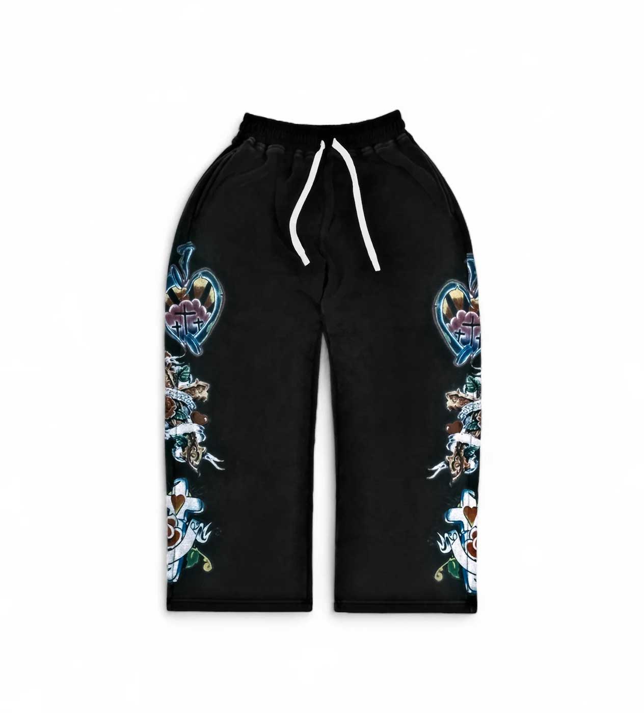 Righteous Risen King Sweatpants in black, tattoo-flash religious graphic down each leg, front view